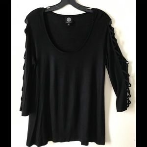 Soft black knit top peek-a-boo sleeves